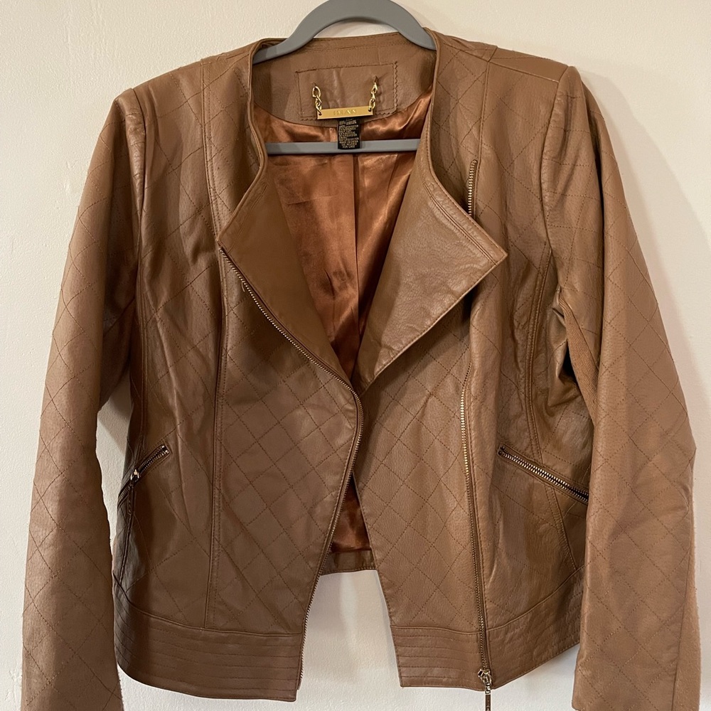 Camel colored leather Iman quilt stitched bomber jacket.